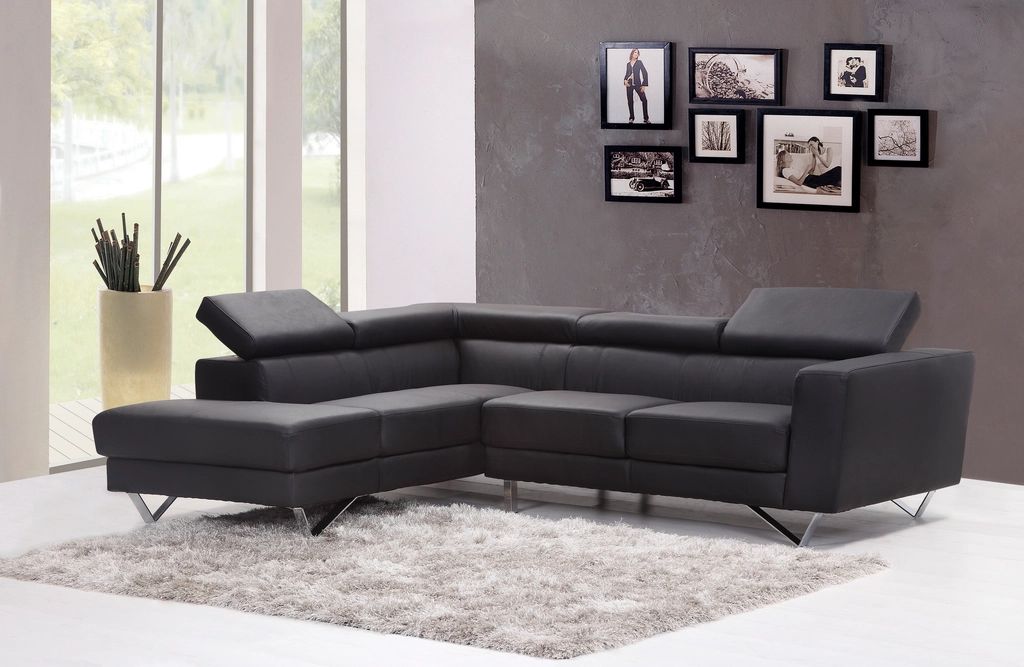 A suite sitting room with a sofa and armchairs